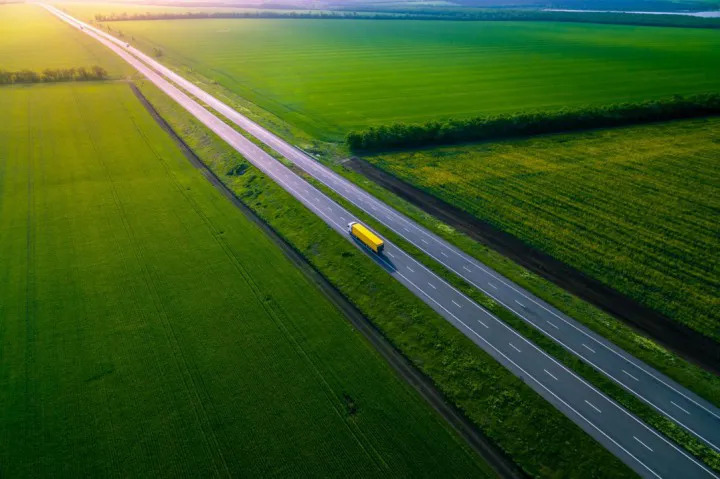Truck in green fields